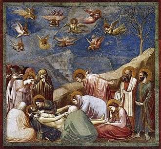  Square fresco. In a shallow space like a stage set, lifelike figures gather around the dead body of Jesus. All are mourning. Mary Magdalene weeps over his feet. A male disciple throws out his arms in despair. Joseph of Arimethea holds the shroud. In Heaven, small angels are shrieking and tearing their hair.