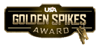 The words "GOLDEN SPIKES AWARD" in gold on a brown polygonal background, with a pair of golden baseball spikes dangling from the last "S" in "Spikes".  Above the lettering reads "USA" in white colour.