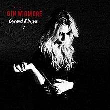Black and white picture of Gin Wigmore, with a solid black background
