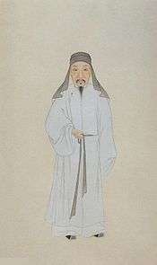 A Qing dynasty scholar in traditional dress