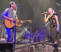 Color picture of singer Gwen Stefani and Blake Shelton performing the aforementioned song live.