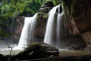 Medium sized waterfall in a tropical forest.