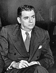 Photo of Hammerstein in middle age, seated, wearing a suit