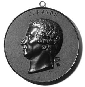 A decorative medal made in France in early 20th century moulded from shellac compound, the same used for phonograph records of the period.