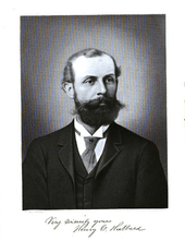 Etched portrait of man with full beard, thinning hair, dressed in suit and tie