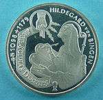 German 10 DM commemorative coin issued by the Federal Republic of Germany (1998): Hildegard of Bingen writing the book (Liber), 'Sci vias Domini', inspired by the hand of the Lord