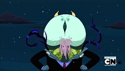 A cartoon demon stands against a starry backdrop. His face is a green mass with a vertical mouth. He is dressed in what appears to be a suit.