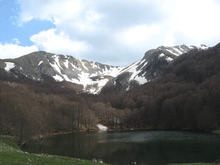 A mountain with a lake.