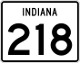 State Road 218 marker