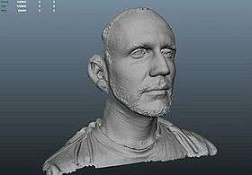 A digital rendering of a man's face in a motion capture software.