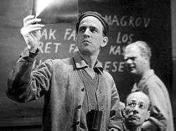 Ingmar Bergman examining a negative