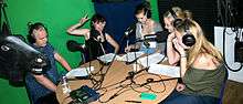 Media students taking part in a show on Itchen Radio. The black horse is also featured.