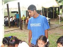Jairo Mora Sandoval overlooks a group of WIDECAST volunteers