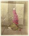 Japanese woman on her head by Baron von Stillfried.jpg