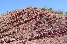 Layered reddish rock