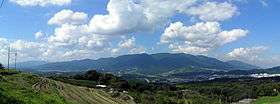 View of the Kongō Range as seen from Gojō, Nara. The Izumi Range can be seen on the left in the back.