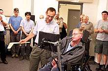 Raymond Laflamme presents a boomerang to Stephen Hawking at IQC