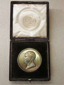 A gold Telford medal in its presentation case, the medal depicts Thomas Telford in profile