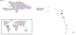 Map of the northern Lesser Antilles, with two islands in the northeast colored green. Inset shows location of this map on a world map.