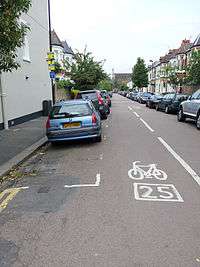 Road marking to indicate street is part of a London Cycle Network route.