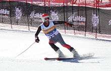 American Paralympic skier Mark Bathum skies downhill as number 23