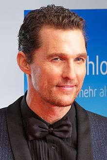 Headshot of a Caucasian male wearing a black tuxedo.