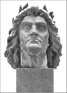 The head of a long-haired man wearing a laurel wreath