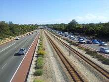 Photograph of freeway and railway