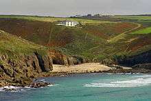 View of the sandy cove of Nanjizal from the Carn Boel headland