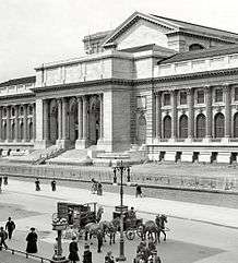 A monochrome photograph of the front of the New York Public Library's main branch