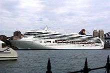 The vessel as SuperStar Leo in Sydney Harbour, 2004