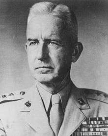 A black and white image of Oliver Smith, a white male in his Marine Corps dress uniform