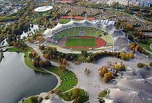 aerial view of stadium and surrounding lake and parking lots