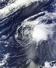 Satellite imagery of a disorganized tropical cyclone in the central Atlantic on October 4