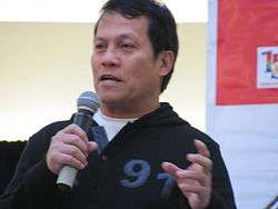 Rey Fortaleza gestures as he addresses an audience at the first monthly singing contest of PNT Idol in 2011