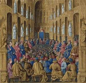 Pope Urban II stands in the center image, far back in the church at the Council of Clermont. The church members sit around the edges of the church, looking up at Urban. Between the church members are tens of common people, sitting or kneeling, also looking up at Urban. The church is packed full with people.