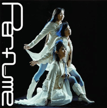 The artwork features Perfume, posing for the song's music video; Perfume member A-Chan is sitting down, Nocchi is leaning behind A-Chan, and Kashiyuka is standing behind them both.