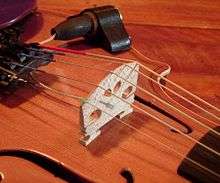Piezoelectric violin bridge pickup