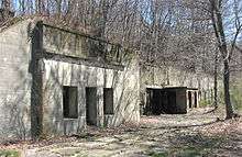 A photo of a concrete casemate or bunker.