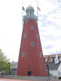 Portland Observatory in 2005, a tall, red, lighthouse-like structure with a windowed dome on top.