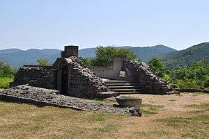 Ruined stairs and gate made of stone