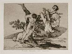 The dismembered corpses of three men are shown humiliated, impaled on the branches of a dead tree.