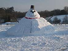 Photograph of a giant snowman with conical base in South Nutfield, Surrey, England
