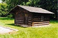 Exterior view of a replica of a cottage from the original village of Fairfield