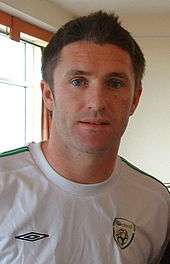 Robbie Keane in his white Ireland shirt
