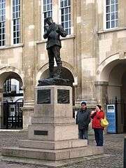 The statue is in front of the Shire Hall
