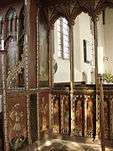 Rood screen with painted saints