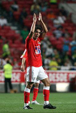 Rui Costa, clapping his hands over his head after scoring a goal
