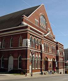 Photograph of the brick façade of Ryman Auditorium on a sunny day.