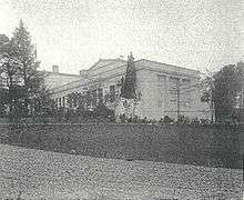 A white Neoclassical school building